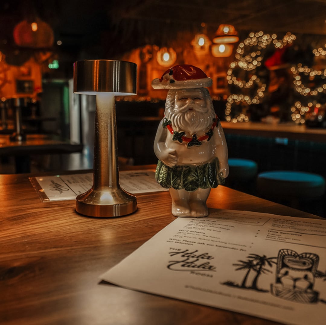 Christmas decor for The Hula Hula Room Tiki Bar in Torrance California designed by Stellen Design logo design and branding agency in Los Angeles California specializing in logo design for hospitality brands