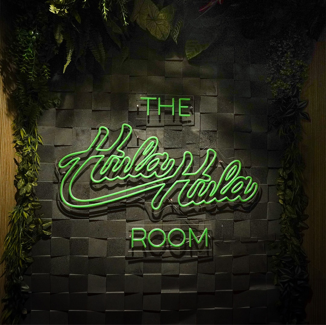 Logo Design in a neon for The Hula Hula Room Tiki Bar in Torrance California designed by Stellen Design logo design and branding agency in Los Angeles California specializing in logo design for hospitality brands